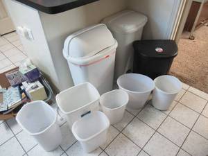 lot 84 image: 9 TRASH CANS IN ALL SIZES AND SHAPES
