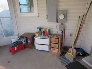 lot 88 image: PORCH LOT INCLUDES STACKON STOOLTOOLBOX WITH 2 BOXES OF SCREWS, 2 WOOD STAND, 1 WICKER STAND AND BROOMS AND DUST PANS