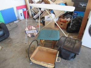 lot 108 image: IRONING BOARD, GROCERY CART, 2 ROCKING OTTOMANS, METAL WOOD CARRIER AND WIRE BASKET