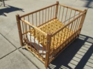 lot 126 image: FOLD UP CRIB (FOR DISPLAY PURPOSES ONLY) WITH MATTRESS AND EGGSHELL