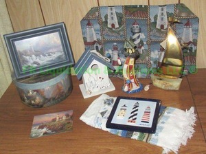 lot 9 image: Thomas Kinkade framed print, DeMott signed brass and soapstone sail boat and more as shown