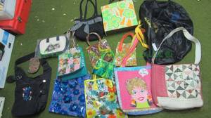 lot 51 image: Assorted designer tote bags as shown