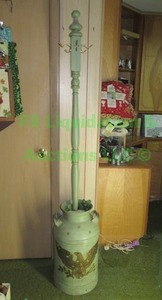 lot 52 image: Vintage 10 gallon milk container repurposed to a coat tree