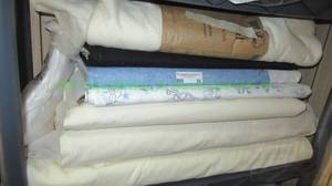 lot 56 image: Fabric rolls as shown