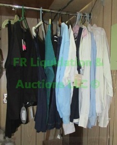 lot 54 image: Assorted clothing many unused with store tags attached