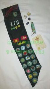 lot 94 image: Vintage Girl Scouts awards sash & pocket knife plus