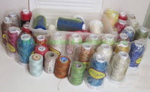lot 187 image: King Tut and other brands rolls of needlepoint thread