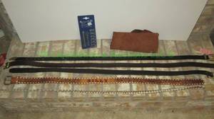 lot 183 image: Realleather mini punch set & leather belts and leather whip, plus leather scrap