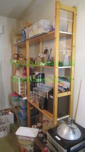 lot 204 image: Solid wood frame shelving unit 65 x 12 x 82. Contents not included