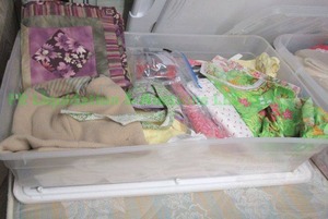 lot 246 image: Assorted sewing and quilting fabrics as shown