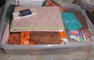 lot 245 image: Assorted holiday theme sewing and quilting fabrics as shown