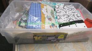 lot 244 image: Assorted sewing and quilting fabrics as shown