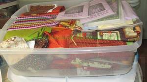 lot 243 image: Assorted sewing and quilting fabrics as shown
