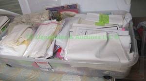 lot 235 image: Assorted sewing and quilting fabrics as shown