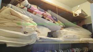 lot 230 image: Rolls and remnants of sewing & quilting fabric