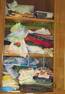 lot 271 image: Assorted hand towels, sewing and quilting fabrics as shown