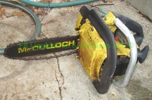 lot 330 image: McCulloch Mac 110 gas powered chain saw