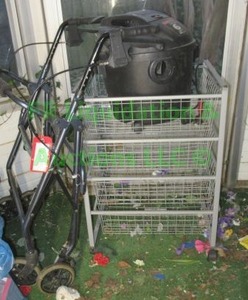 lot 353 image: 6 gallon wetdry vac, walker and storage rack