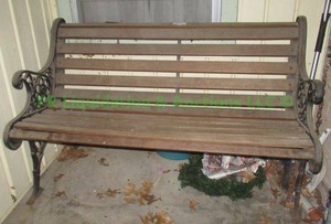 lot 338 image: Wood seat cast iron frame patio bench