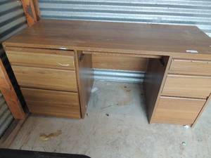 lot 30 image: Light brown computer desk 5 drawers 1 slide out for notebook slide out keyboard tray