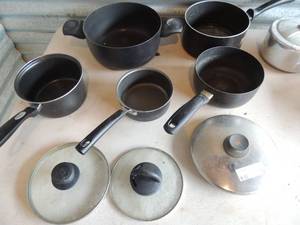 lot 34 image: lot of pots and pans with lids- 4 qt. 6 qt. 8 qt. also Hawkins pressure cooker