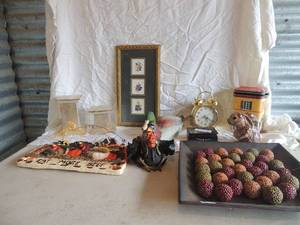 lot 42 image: Home dcor- Table centerpiece, Eat more chicken sign, rooster in an army jacket, tin can bunny and more