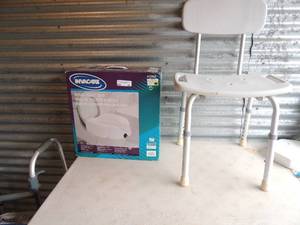 lot 49 image: Invacare medical lot. 4 used walkers (collapsible), toilet lyft seat, shower chair, bedside commode and NIB side rail for hospital size bed
