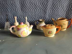 lot 124 image: 2 bubble glass handled flower decor tea patio 1 has no lid 1 pink white handled tea pot large spout  3 bells