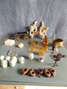 lot 130 image: Fish Windchime 2 matching wall hanger for candles  glass horse wagon with metal wheelsblack in color various trinket boxes  and candle holders and napkin holders