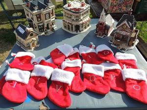 lot 148 image: Christmas lot-  Holiday houses Nottingham Hotel, Nicks lighting,, University Club various mini stocking with different letters on them