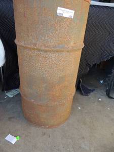 lot 168 image: Mobil Oil Barrel 27 tall 14 diameter  Rusty