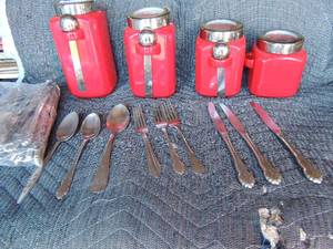 lot 181 image: 4 Main Stay Maroon colored canisters 3 spoons large quantity of assorted spoons, forks, knifes