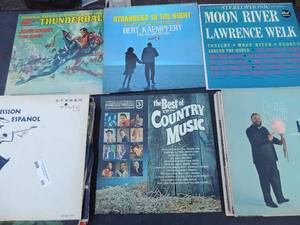 lot 60 image: Vinyl records, Thunder ball John Barry, Strangers in the Night, Moon River, Stonewall Jackson jimmy dickens, Bob Atcher, Ray Price and many more