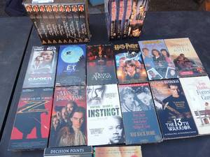 lot 59 image: Lot of VHS tapes- Instinct, ET, Message in bottle, The mask of Zorro all genres romance, horror, Disney