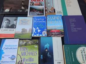 lot 65 image: Book lot-A Lucky child by Thomas Buergerthal, The Whale song by Dion Sheldon, Nature in America, Readers Digest Good health facts , Websters dictionary and morel