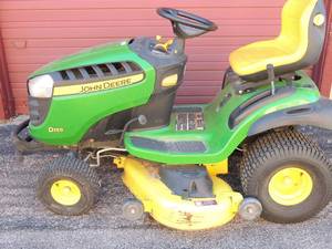 lot 27 image: John Deer Riding mower with 124 hours of use, 48 inch cutting. Green and yellow like new.  Starts right up, tires need air from sitting (started 1-18-2020)