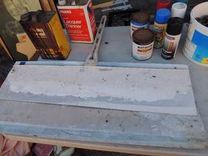 lot 76 image: Painting lot- Lacquer thinner, Dura seal, several cans of enamel and spray paint, 2 paint shields with handle 2 extra scrapers(partial cans)