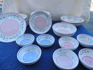 lot 77 image: Blue and pink dish set Caleca hand painted made in Italy- 8 dinner plates, 4 pink soup bowls, 3 blue soup bowls, 11 pink salad plates 1 has a chip and a large serving bowl