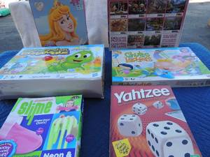 lot 91 image: Kid lot- Yahtzee, Slime kit NIB, Princess puzzle 45 pieces, Scramble Scaterpillaer, 10 Super Lox Art gallery puzzles