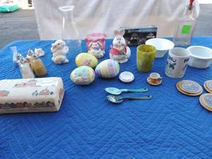 lot 96 image: Nib knack lot- Glass Easter eggs, bunny Easter napkin holder, antique liquor bottle, 4 sets of S&P shakers and more