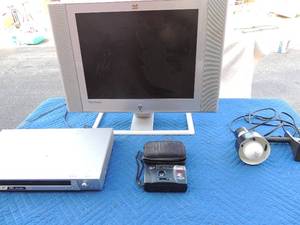lot 102 image: View Sony TV unknown working condition 20. Sony MP3 player no remote unknown working order Canon camera in case and desk lamp light