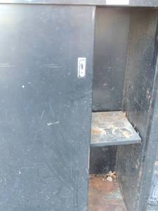 lot 112 image: Black metal tool cabinet with double sliding doors