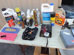 lot 116 image: Misc. lot- Car wax sealer and finish Straps, WD40 floor protector electric sun trackerparagon time control