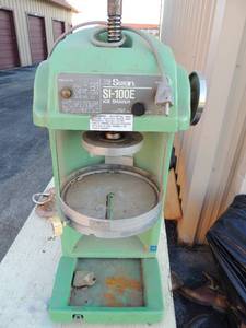 lot 28 image: Swan S1-100E Block ice shaver Teal blue color preowned 14 HP motor shaves 4-5 lbs of iceminutes. Works  - OPEN YOUR OWN SNO CONE STAND