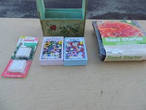 lot 193 image: Garden lot- seed holder with handle to carry seed packs, Jobes fertilizer spikes NIP, seed starter 36 cells NIP, 2 bird and butterfly wild flower blends NIP covers 100 square feet