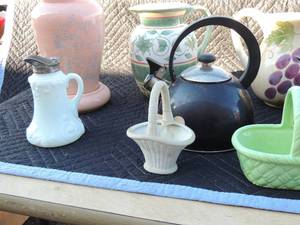 lot 200 image: Pfaltzgraff pitcher, marble flower pink vase, black tea kettle green baskets by Haeger, yellow pitcher and more