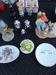lot 216 image: Homedecor Cheri and Calvin porceline dolls x 4 each 4 tal. Soap dish and Paula warbler bird by Andrea, Paul Sebastion 1991 Boy and girl with dogs and 3 small rose trinket boxes