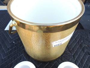lot 223 image: Gold ice bucket no lid 2 Avon blue and white mugs, 2 little piggy toys, dispenser with rose on front and child with baby porcelain