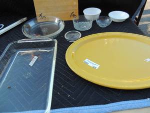 lot 226 image: 2 Pyrex pie plates, Large yellow platter made in france by Emile Henry, large pyrex baking pan and small dip bowls