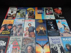 lot 233 image: Lot of VHS movies- The Boat, creepy classic, batman returns, secret angent, dragon heart and more
